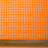 Seersucker vichy naranja neón y crudo
