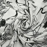 Lin viscose imprimé hérons fond blanc