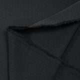 Tissu tailleur laine mélangée souple sergé noir profond