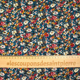 Mousseline rayée dorée imprimée fleurs fond canard