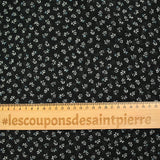 Muselina estampada flores y lunares fondo negro
