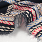 Satin de viscose imprimé cordes bleu et rouge fond marine