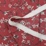 Crêpe viscose imprimé lien floral fond bordeaux