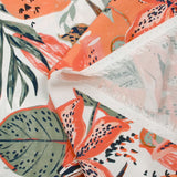 Viscose imprimée fleurs de la jungle corail fond blanc