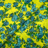 Satin 100% soie imprimé fleurs bleues fond anis