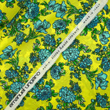 Satin 100% soie imprimé fleurs bleues fond anis