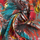 Viscose imprimée explosion tropicale fond rouge
