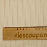 Coton tissé-teint rayé fuchsia fond sable