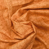 Coton imprimé empreinte fond orange foncé