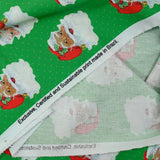 Coton imprimé père Noël à pois fond vert