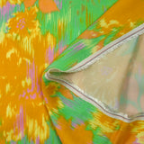 Satin de viscose imprimé brume florale moutarde fond vert