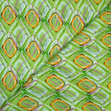 Satin de viscose imprimé disco retro fond vert