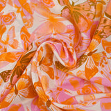 Viscose imprimée jacquard papillons lilas et orange fond blanc