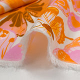 Viscose imprimée jacquard papillons lilas et orange fond blanc
