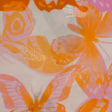 Viscose imprimée jacquard papillons lilas et orange fond blanc