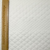 Matelassé variation de losanges blanc cassé