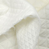 Matelassé variation de losanges blanc cassé