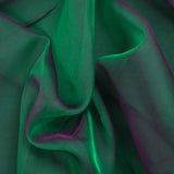 Mousseline 100% soie unie vert émeraude changeant prune