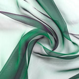 Mousseline 100% soie unie vert émeraude changeant prune
