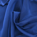 Mousseline 100% soie unie bleu foncé changeant noir