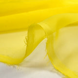 Mousseline de 100% soie unie jaune fluo