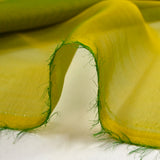 Mousseline 100% soie unie jaune olive changeant vert