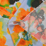 Jacquard de viscose satiné imprimé grandes fleurs fond ciel