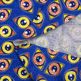 Coton imprimé ethnique Kampen orange et jaune fond bleu roi