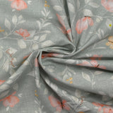 Coton imprimé fleurs magiques fond gris
