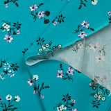 Popeline de coton imprimée bouquet champêtre fond turquoise