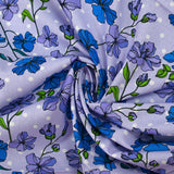 Popeline de coton imprimée fleurs grimpantes fond à pois mauve