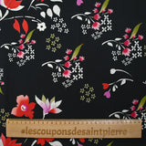 Popeline de coton imprimée archipel floral fond noir