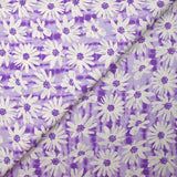 Popeline de coton imprimée vibration de marguerite fond violet