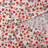 Popeline de coton imprimée fleurette dans le vent rouge fond blanc
