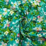 Popeline de coton imprimée jasmin fond turquoise
