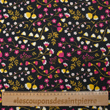 Popeline de coton imprimée tiges de fleurs jaune et fuchsia fond noir