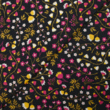 Popeline de coton imprimée tiges de fleurs jaune et fuchsia fond noir