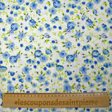 Popeline de coton imprimée fleurs du temps bleu et vert anis fond blanc