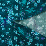Popeline de coton imprimée fleurs turquoise fond bleu foncé