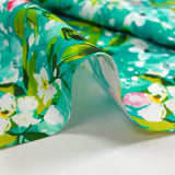Popeline de coton imprimée jasmin fond turquoise