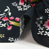 Popeline de coton imprimée archipel floral fond noir