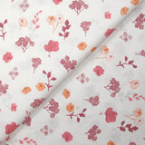 Popeline de coton imprimée poésie florale rose fond blanc