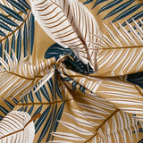 Popeline de coton imprimée grandes feuilles fond beige