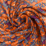 Mousseline imprimée bande satin violet fond orange