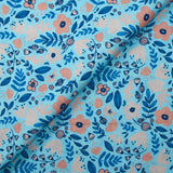 Popeline de coton imprimée bonheur floral fond bleu ciel