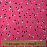 Popeline de coton imprimée fleurs printanières fond rose barbie
