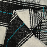 Lainage polyester à carreaux noir ligne turquoise