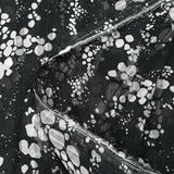 Mousseline imprimée bande satin effervescence fond noir