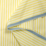 Coton tissé-teint Rudy rayé 3 mm jaune beurre fond blanc