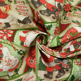 Polycoton imprimé cartes de vœux de Noël fond bordeaux
